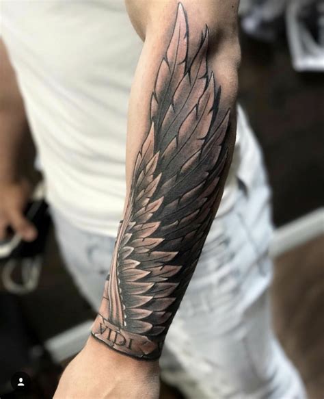 tatuaggio scritta braccio uomo|Tatuaggio braccio: 250 immagini e idee per uomo e。